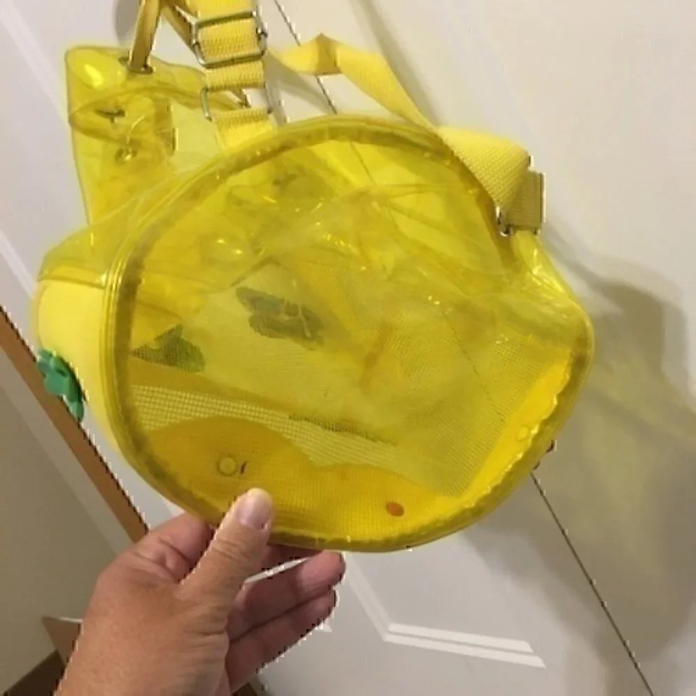 Girl’s yellow beach bag